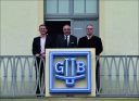 Markus_Dressler_Reinhard_Reichel_and_Frank_Kittel_on_the_Balcony_decorated_with_GUB_Logo_prot.jpg
